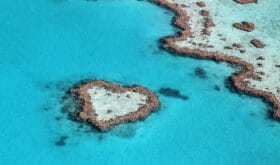 Heart reef impact in the tropical blue ocean
